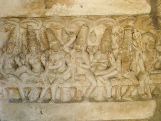 Selective focus Close up image of ancient sculptures carved on stone of Hindu God and Goddess on a temple wall
