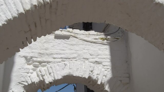 Ancient arcs in a moorish street in Comares, Axarquia, Spain. Tilt