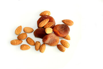 Nuts and dried fruits, almond and apricots natural, white background