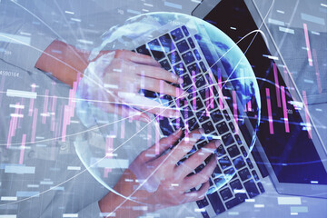 Double exposure of woman hands working on computer and forex chart hologram drawing. Top View. Financial analysis concept.