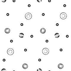 abstract seamless pattern with imprint different small circles in hand printing technique