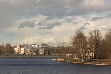 Spring day by the river embankment