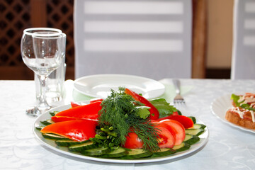 Healthy raw kale and quinoa salad with cranberry and almonds