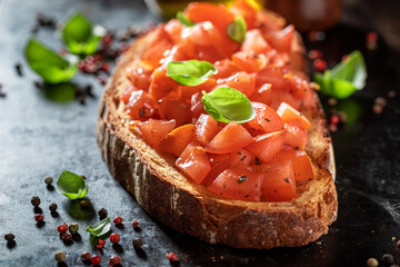 Delicious bruschetta with fresh tomato for breakfast. Italian cuisine.