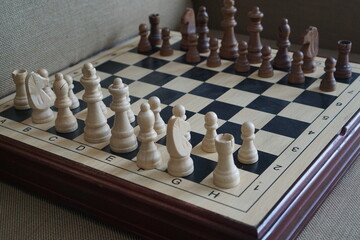 Chess is a two-player strategy board game played on a checkered board with 64 squares arranged in...