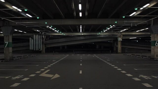 Empty car underground parking. Cars on the background