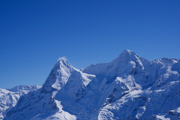 Panorama of Bernese Alps with Mountain Peaks Eiger and Mönch (monk), seen from Mürren, Switzerland.