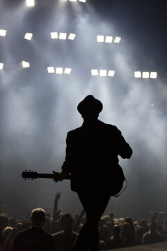 Fall Out Boy Lead Sing, Patrick Stump Is Silhouetted As He Performs In United Center Chicago