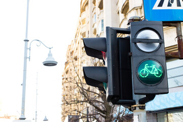 Low angle view of bicycle traffic signal, green light, road bike