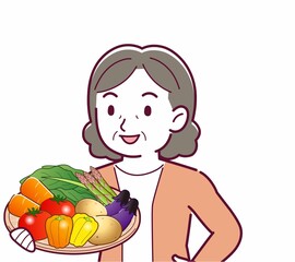 緑黄色野菜を持っている人