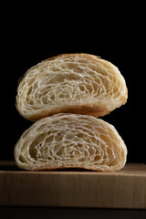 Obraz premium Plain butter croissant crescent pastries, Freshly baked croissants. Warm Fresh Buttery Croissants on a tray.