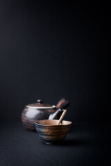 Traditional, handcrafted ceramic on paper background. Soft focus. Copy space.