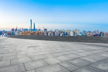Fototapeta na wymiar Empty square floor and Shanghai skyline with buildings at dusk,China.High angle view.