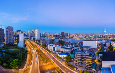 Fototapeta na wymiar Aerial view of modern city skyline and buildings at dusk in Shanghai.