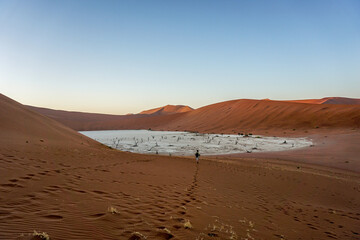 Being the first person to enter Deadvlei in Namibia during sunrise.