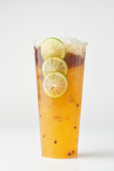 Passion fruit milk tea with white background