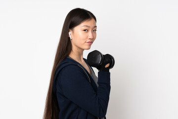 Young sport asian woman isolated on white background making weightlifting