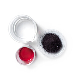 Cosmetic chemicals ingredient on white laboratory table. Potassium Permanganate Liquid, KMnO4,  Alcohol. Top View