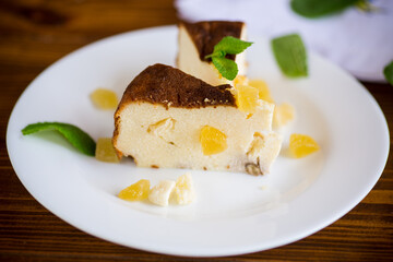 sweet baked cottage cheese casserole with nuts and candied fruits