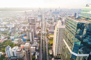 Fototapeta na wymiar Aerial view Cityscape of Bangkok skyline with Road