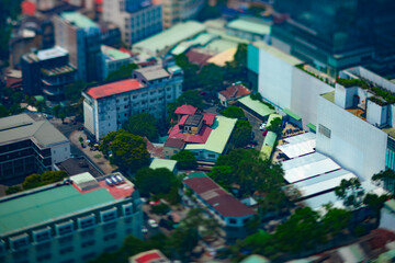 A high angle view of miniature cityscape at the downtown in Ho Chi Minh daytime tiltshift