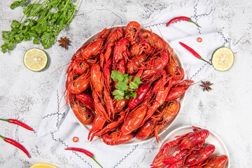 Boiled red crawfish or crayfish in plate on table