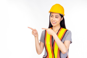 Happy beautiful young worker woman with isolated on white background pointing finger and look at copy space for insert advertisement Happiness and smiley face Beautiful engineer female portrait
