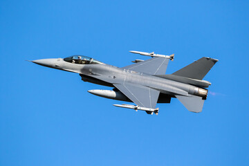 Military air force fighter jet interceptor airplane in full flight. - 421810542