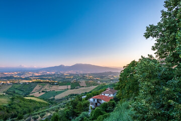 Fototapeta na wymiar Beautiful sunset on the countryside of Marche in a summer evening