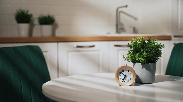 The clock shows seven in the morning.