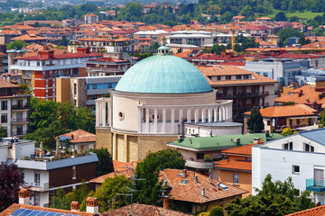 Obraz premium View of the catholic church Chiesa Parrocchiale di Santa Lucia and historical buildings in the Bergamo in northern Italy. Bergamo is a city in the alpine Lombardy region.