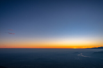 Winter sunset from an alpine peak of Friuli-Venezia Giulia