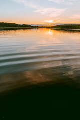 Sunset over the Lielupe river in Latvia during warm summer evening