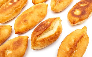 Fried patties in oil isolated on a white background.