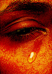 Eyes with tears of a crying girl in red paint.