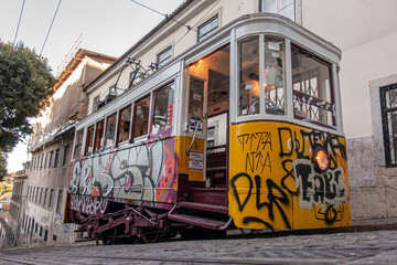 typical tramways circulating through the streets of Lisbon