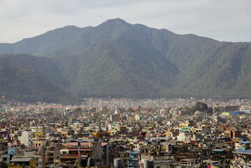 View of Kathmandu (Nepal) with a mountain in the background on a clear sunny day