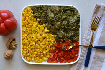 stir-fried mushrooms in walnut pesto with roasted red capsicum and sweet corn