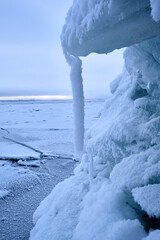 Naklejka na ściany i meble chunks of ice on the water in winter