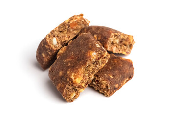 Pieces of energy bars with cranberries on a white background. Muesli or grain bars. Sports nutrition