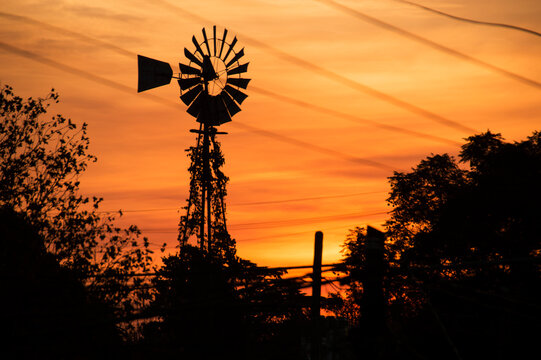 silhouette of a windmill