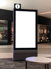 Mockup standalone big screen info kiosk. Digital media with blank white screen modern panel, vertical pylon display, signboard for advertisement design in a shopping center and mall.