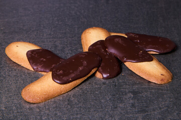 Homemade cereal and chocolate covered flat cookies