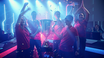 Diverse Esport Team Winner of the Video Games Tournament Celebrates Victory Cheering and Holding...