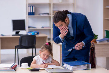 Young male employee and his little girl in the office