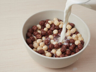delicious breakfast chocolate balls with milk