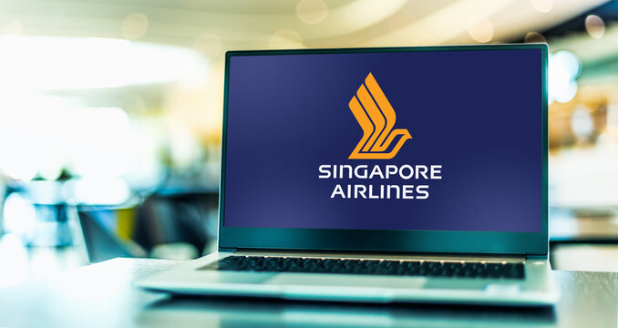 Laptop computer displaying logo of Singapore Airlines
