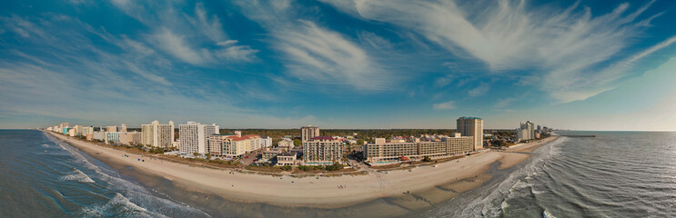 Fototapeta na wymiar Panoramic aerial view of Myrtle Beach skylineon a sunny day from drone point of view, South Carolina