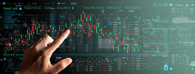 Businessman hand working with digital computer touch screen with Finance Content marketing  concept...