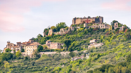 Fototapeta na wymiar Vicalvi village with the ruins of the 11th century Lombard castle on top of the hill located amid the Italian Apennine mountains of the south-east Lazio region